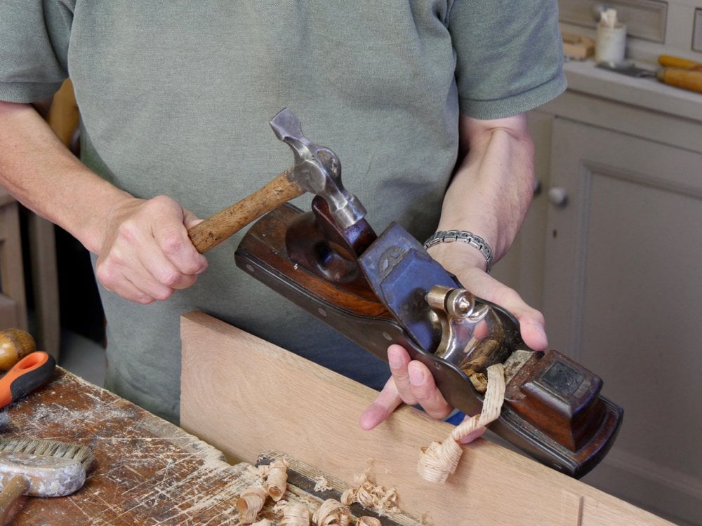 Tapping from the top is one way to set the depth of the cutting iron...